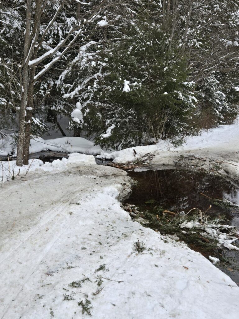 Attention snowmobilers: Washout on the Snow Bridge on E109