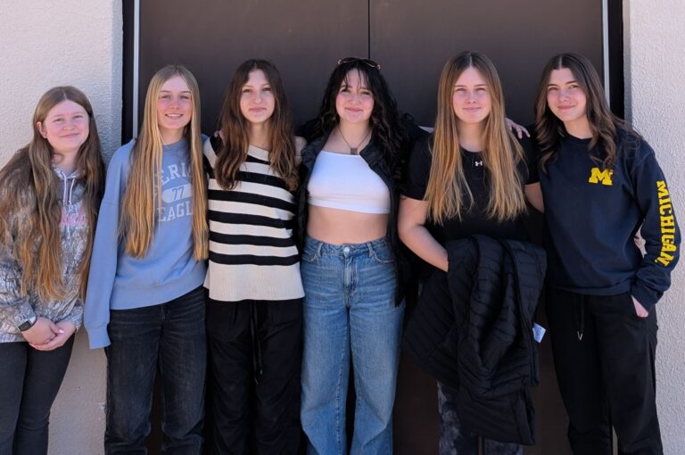 Young conservation group cleans up the streets and motivates others on Earth Day